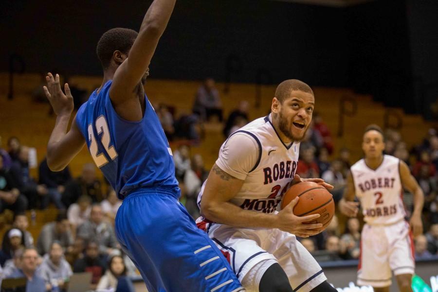 Aaron Tate tipped-in a Marcquise Reed floater as time expired to propel RMU to a 53-52 win over CCSU. 