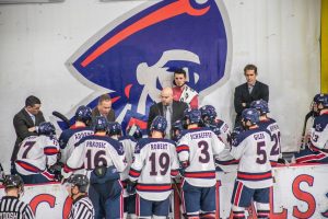 The Robert Morris mens hockey team discusses a play during a game against Niagara Nov. 2, 2018. (David Auth/RMU Sentry Media) Photo credit: David Auth