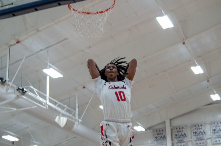 MOON TOWNSHIP -- Koby Thomas dunks against LIU Brooklyn on Febuary 21, 2019 (Mike Evans/RMU Sentry Media). This was the signature moment in the teams win.