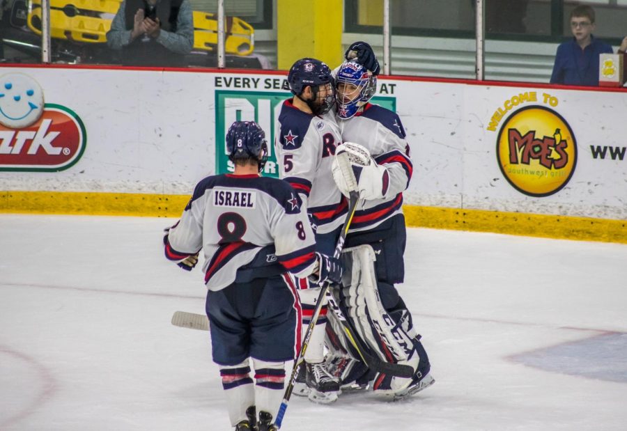 PITTSBURGH+--+The+Colonials+celebrate+a+victory+over+RIT+%28David+Auth%2FRMU+Sentry+Media%29.