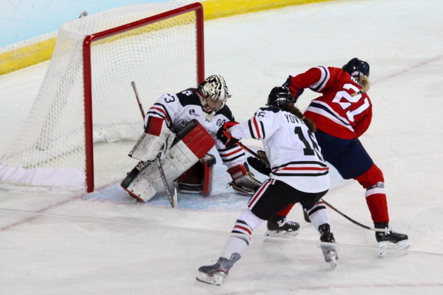 Aerin Frankel stops a shot from Kyleigh Hanzlik, one of her 20 saves on the day. Photo Credit: Nathan Breisinger