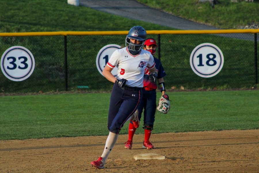 Madison+Riggle+rounds+the+bases+following+her+home+run+in+the+second+game.+It+stood+as+the+game-winning+run+against+UIC.+Photo+Credit%3A+Tyler+Gallo
