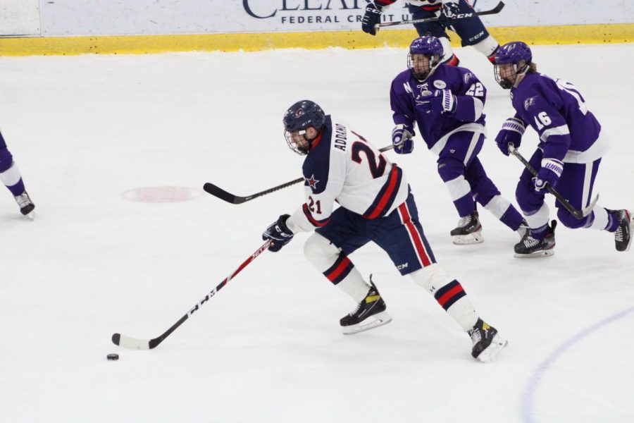 Justin Addamo carries the puck against Niagara in the AHA Playoffs. Photo Credit: Tyler Gallo/Colonial Sports Network