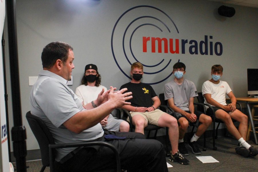Chris King talks to RMU students at the Sentry Media Retreat.