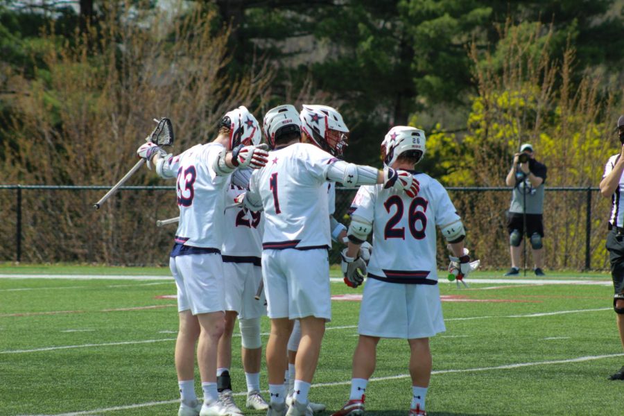 Mens+lacrosse+celebrates+a+goal+against+Cleveland+State.+Photo+credit%3A+Ethan+Morrison
