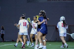 Jordan Anderson and Jerica Obee hug after Andersons goal. Photo Credit: Tyler Gallo