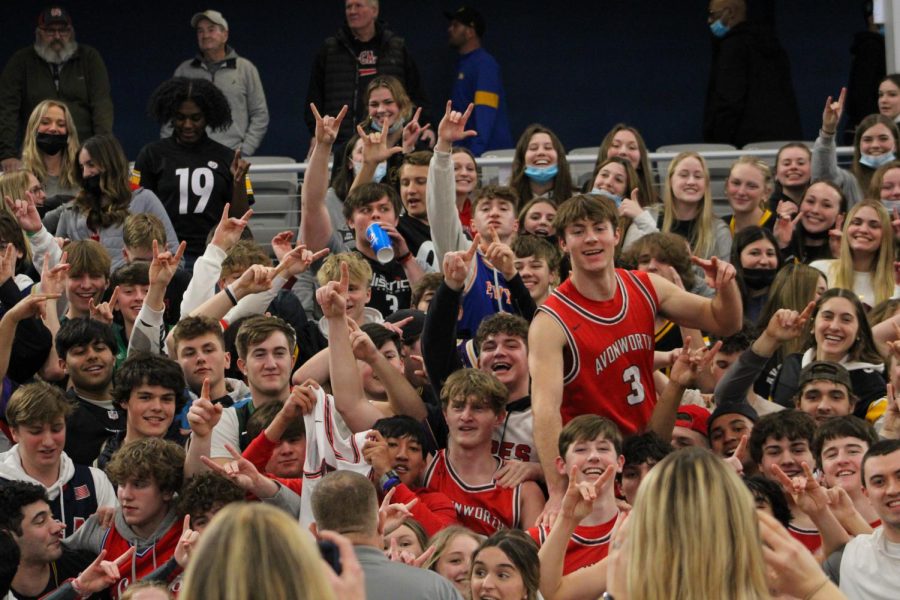 The Avonworth basketball team celebrates their semifinal victory at the Events Center. Photo credit: Tyler Gallo