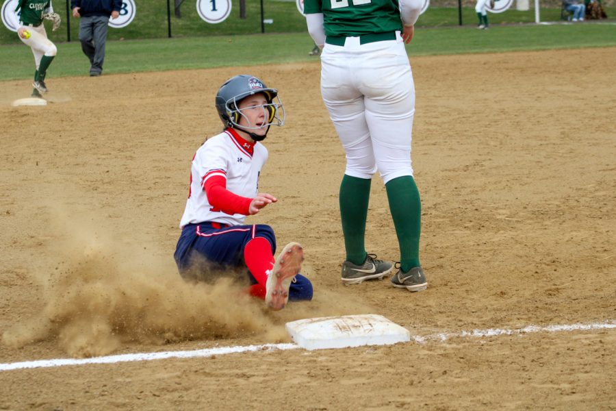 Julia Ehrman slides into third base against Cleveland State. Photo credit: Tyler Gallo