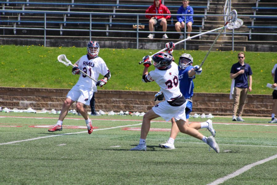 James Leary rips a shot against Air Force. Photo credit: Cameron Macariola