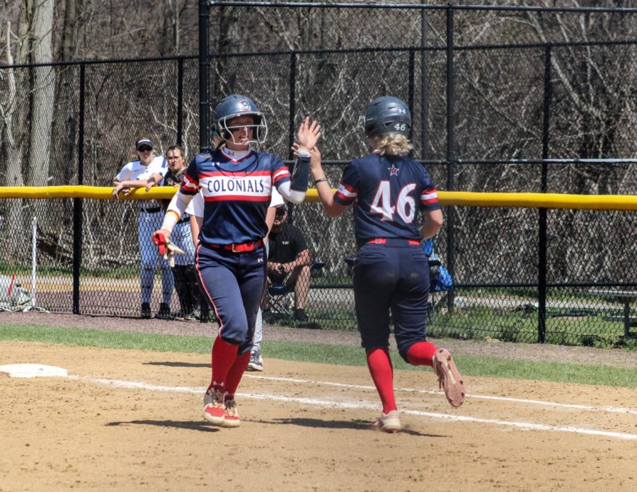 Meadow+Sacadura+high+fives+Bailee+Bertani+in+game+one+of+the+doubleheader.+Photo+credit%3A+Cameron+Macariola