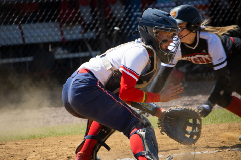 Catcher Meadow Sacadura makes a play at the plate against IUPUI. Photo credit: Ethan Morrison