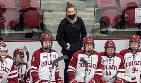 Walkland (above) looks on from the Colgate bench