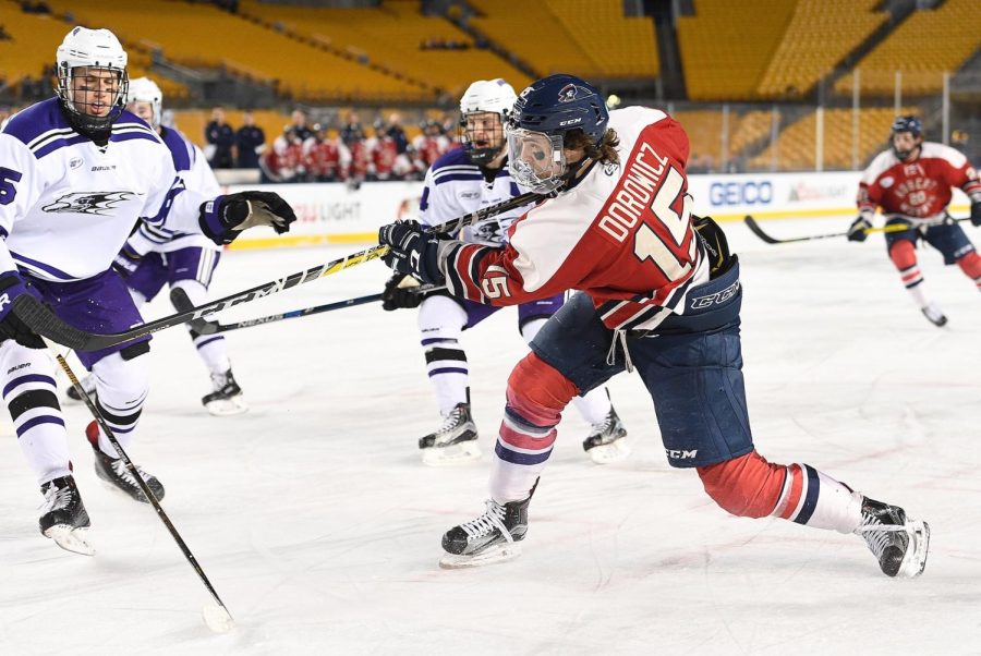 Dorowicz shooting a shot against Niagara in the game at Heinz Field Photo credit: Justin Berl/RMU Athletics
