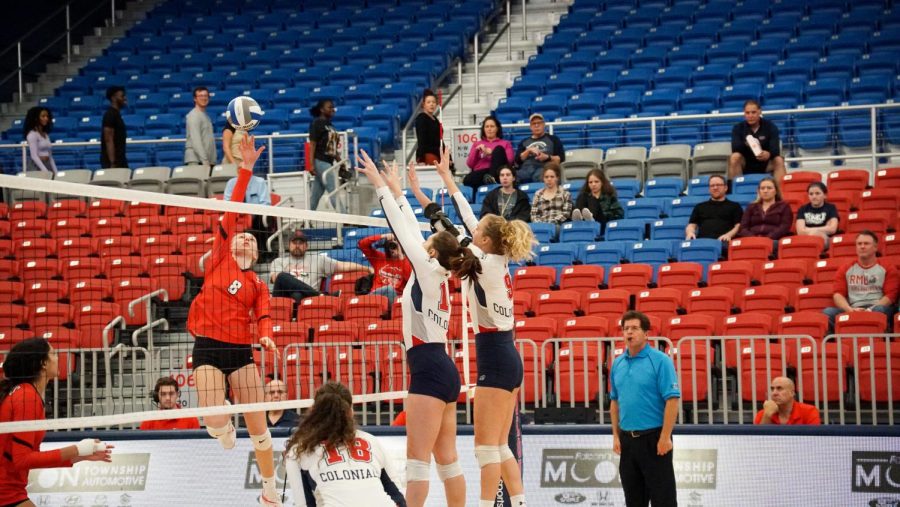 Abby Ryan and Alyssa Hudak attempt to block Paula Gurschings spike in the 3-1 loss to Youngstown State
