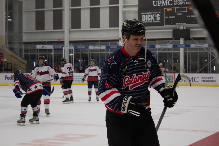 RMU womens hockey coach Logan Bittle smiles during the 2nd Annual Celebrity Hockey Faceoff