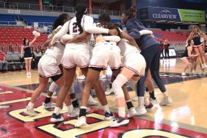 The team huddles during their 83-59 loss against Wright State Photo credit: Hope Beatty