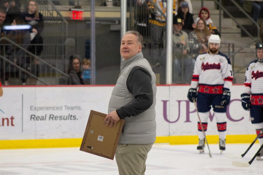 Schooley accepting the St. Louis Amateur Hockey Hall of Fame Honor at the Celebrity Hockey Game Photo credit: Julia Wasielewski
