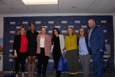 The National and Women in Sports Panelists pose for a photo. 
