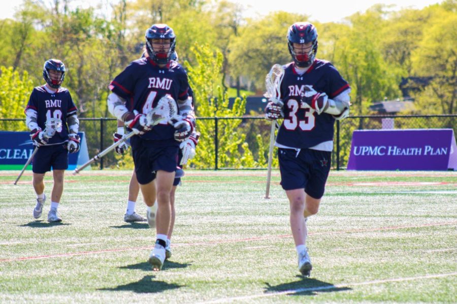Will+Johansen+%2833%29+and+Kean+Moon+%2844%29+each+had+a+goal+for+the+Colonials+in+the+12-4+loss+in+the+ASUN+semifinals+against+Air+Force+
