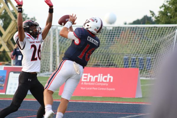 Anthony Chiccitt catches a touchdown patch in the 31-21 win over St. Francis